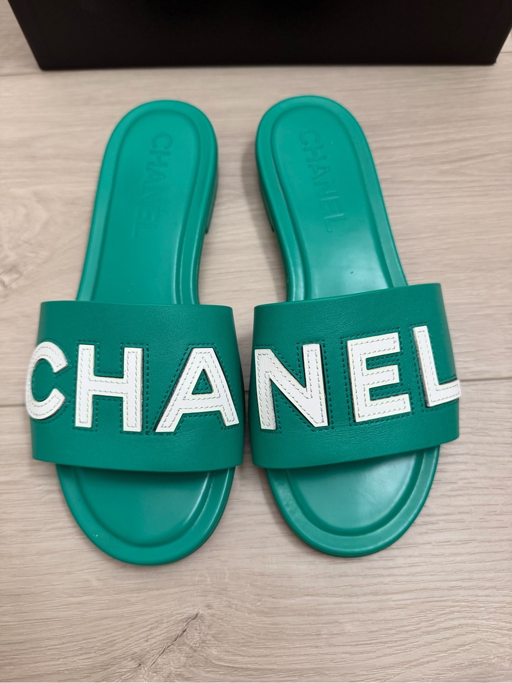 CHANEL Green Slide Sandals with White Logo